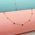 گردنبند و دستبند گوی مکعب